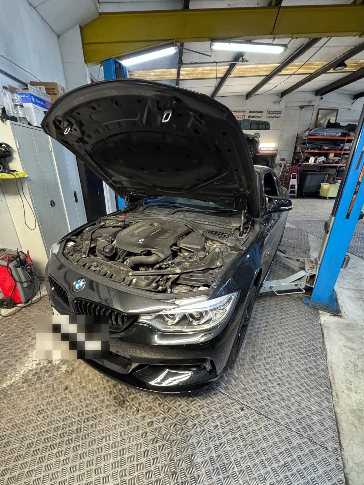 BMW engine bay during service